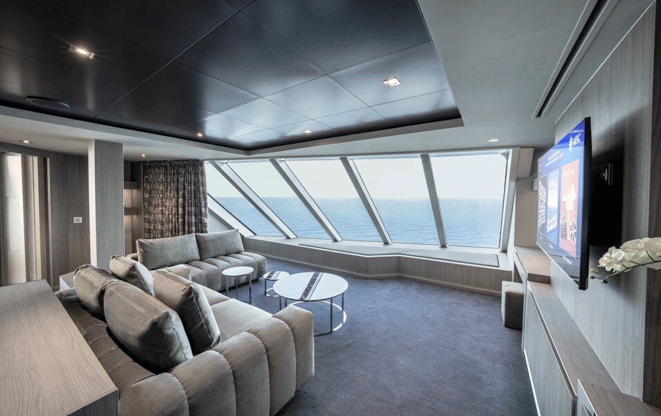 Luxury suite with panoramic ocean views and modern decor onboard | MSC Cruises Luxury suite with panoramic ocean views and modern decor onboard | MSC Cruises