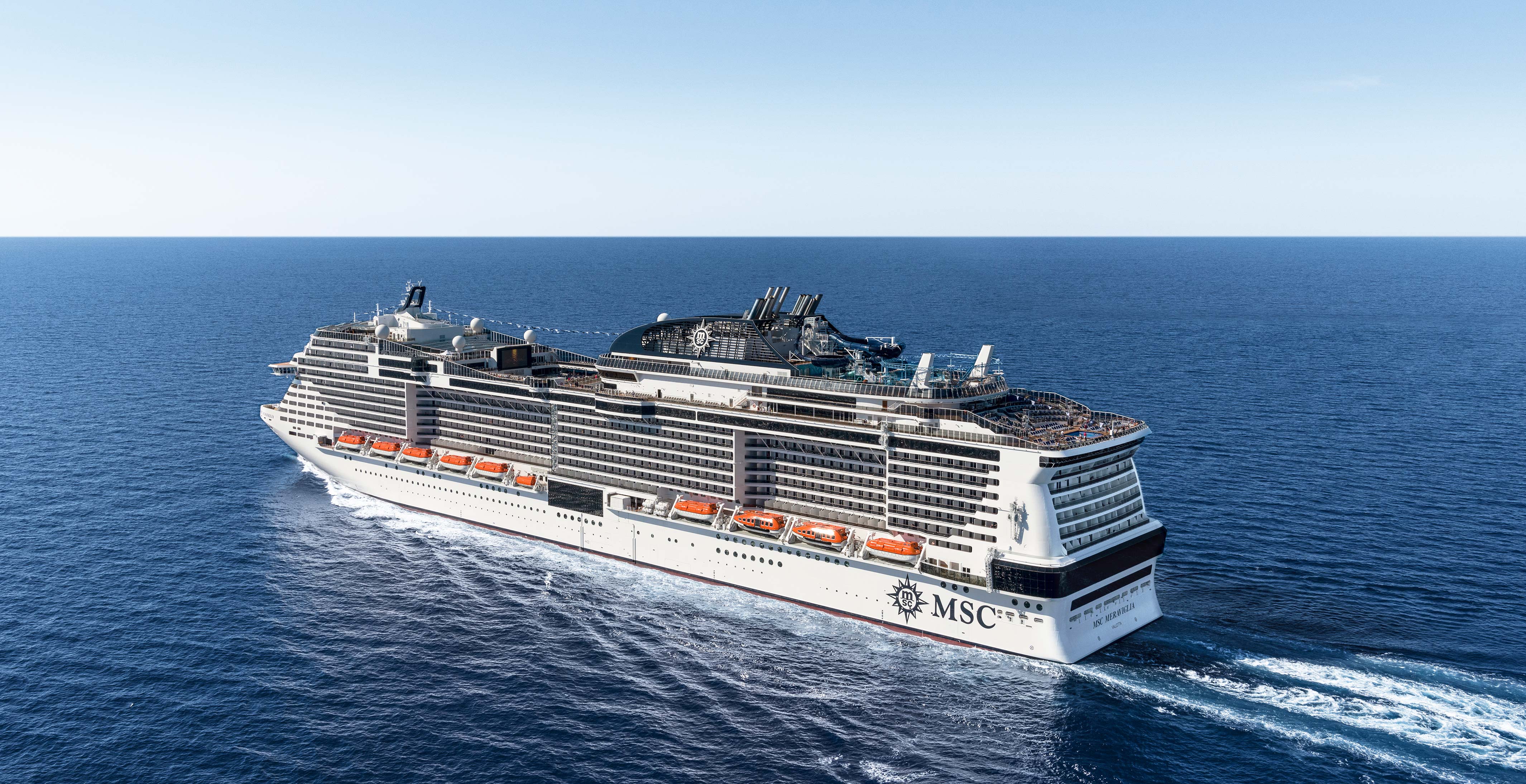An MSC cruise ship sailing on a calm blue ocean | MSC Cruises
